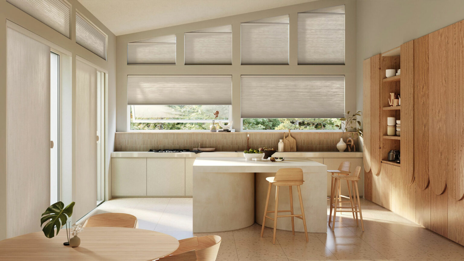 Modern kitchen with light wood cabinets, an island with two stools, large windows, built-in shelves, and a small dining table. Perfect for home renovation Charlotte projects, its natural light creates an airy, minimalist feel.